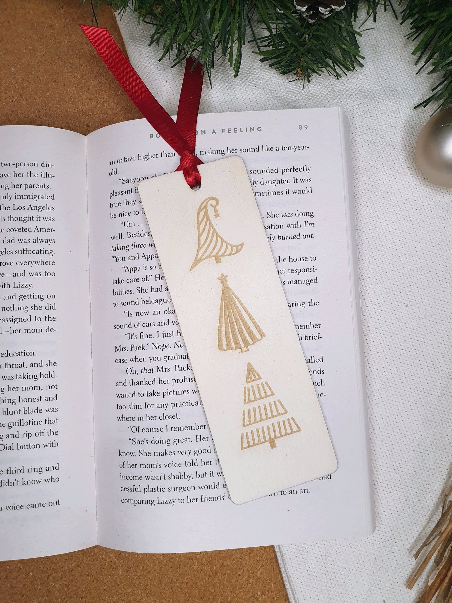 3 unique modern Christmas trees engraved in a bookmark. Ribbon bookmark page keeper.