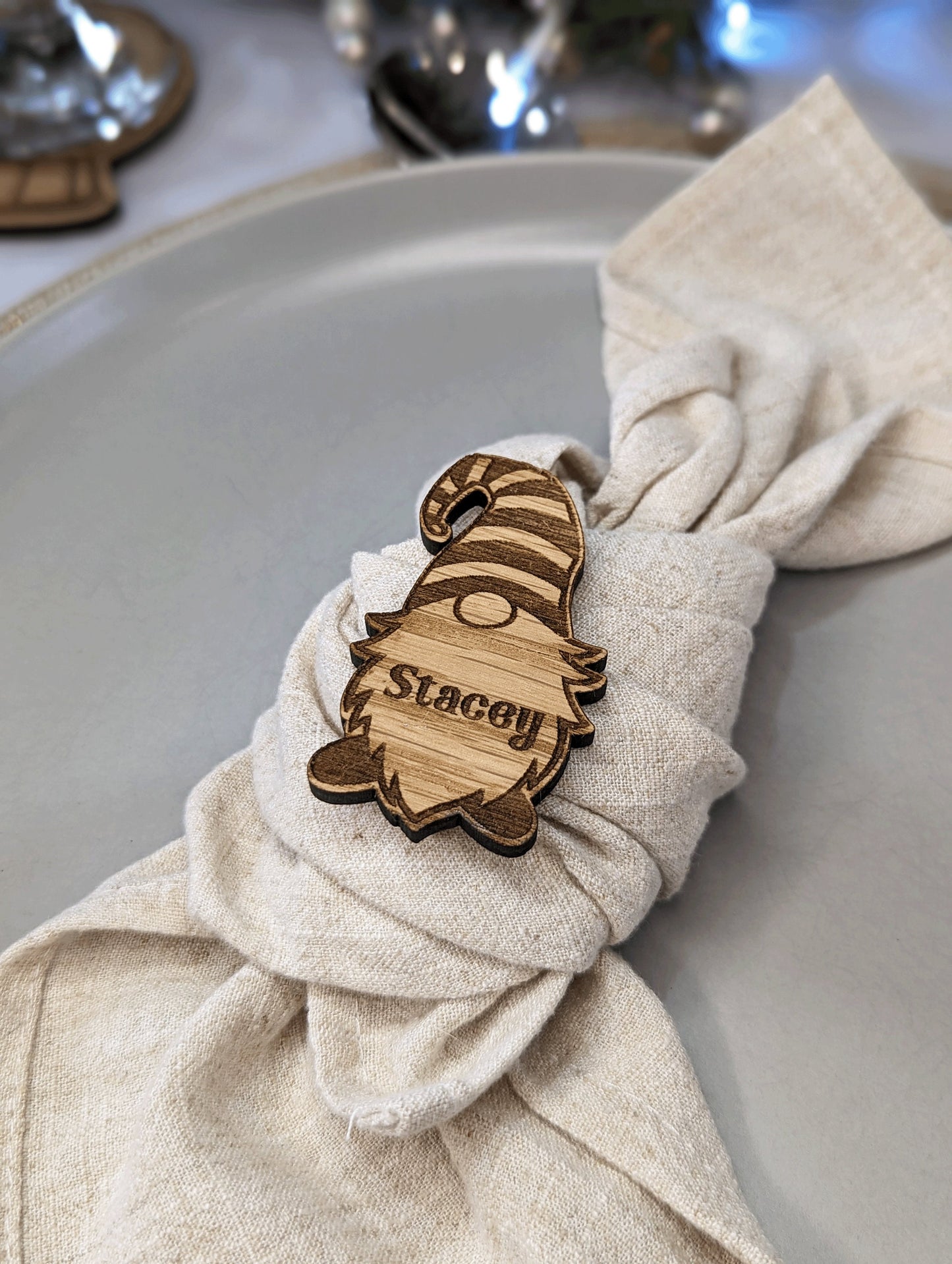 Rustic christmas gnome on a kitchen plate. Made with personalised name