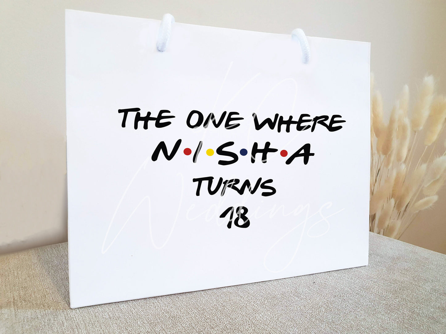 small white rop handle birthday gift bag. With the friends the one where and personlaised name.