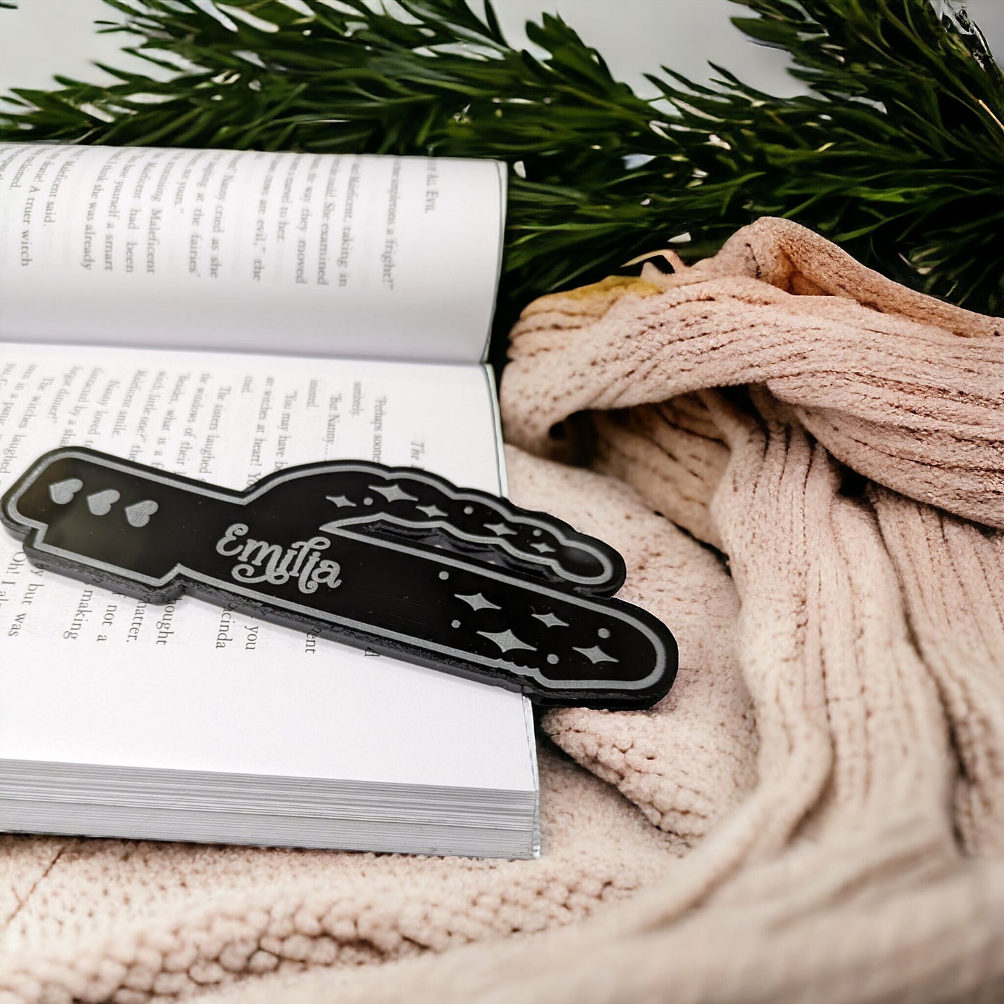 Smut reader bookmark in the shape of a vibrator. Made of black acrylic to keep your page in a book