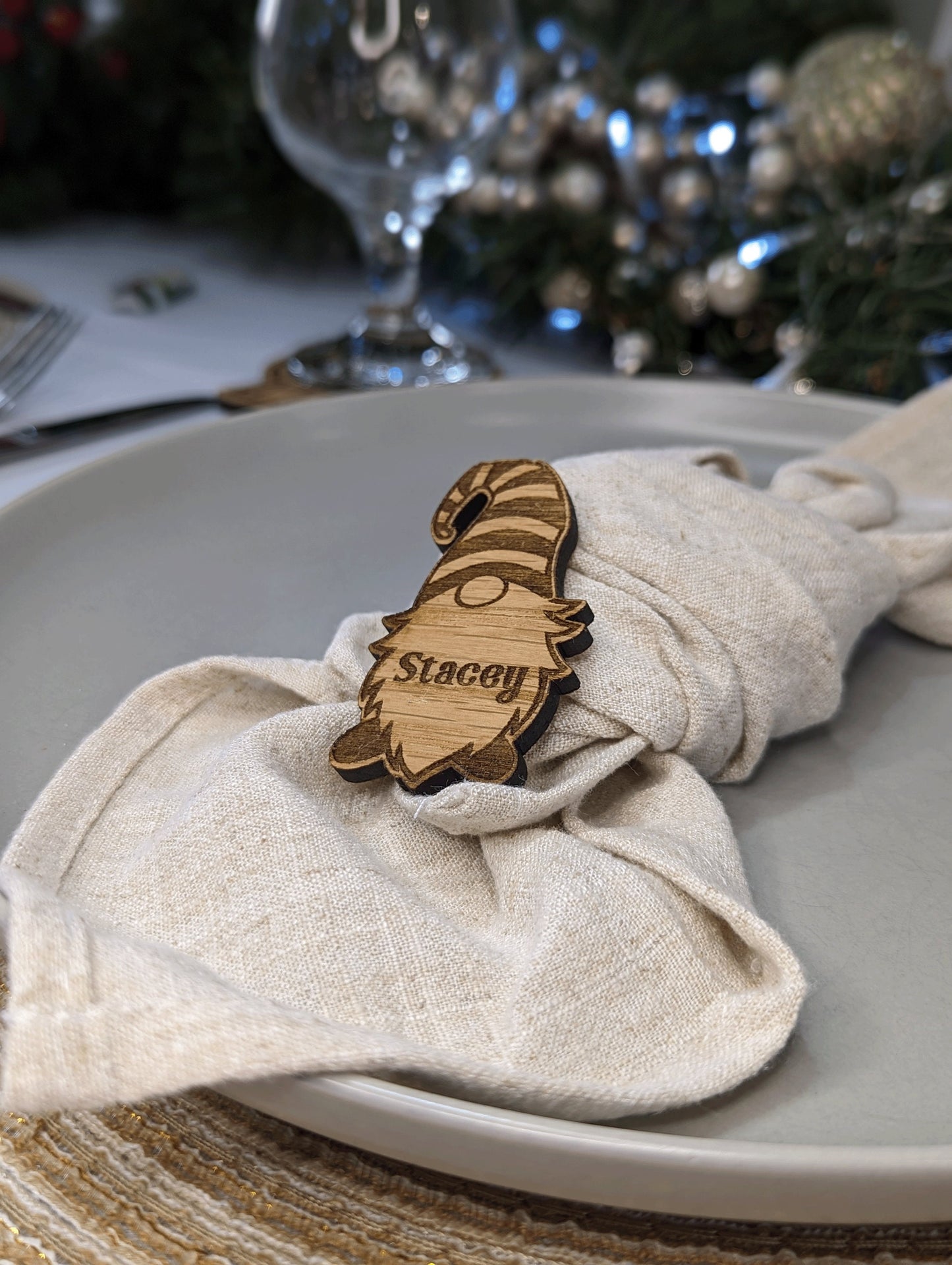 christmas dinner table name in the shape of gonk. Made from wood.