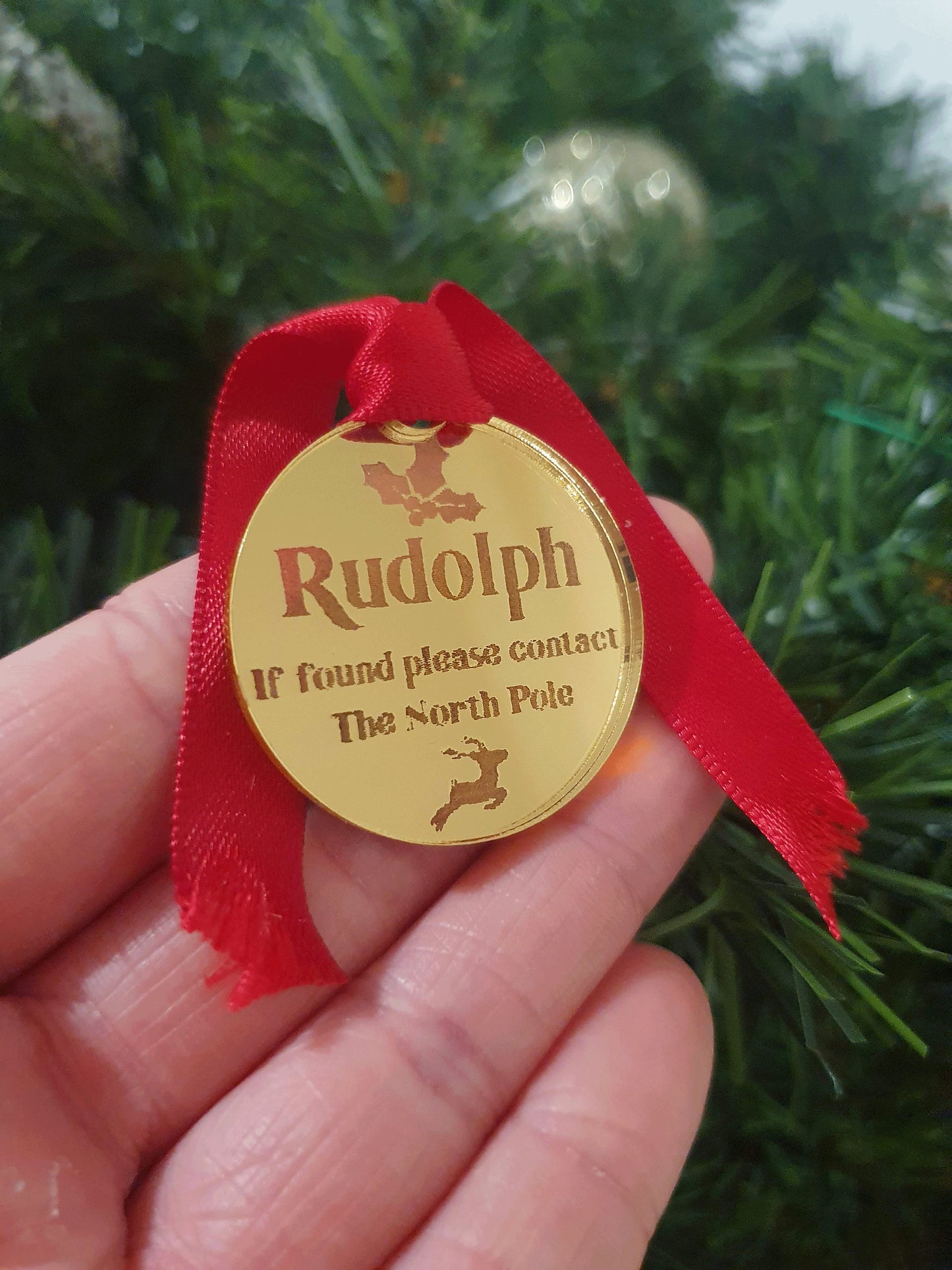 beautiful shinny gold ID tag for santas reindeer. Missing tag can be placed in the grass outside for young children to find after rudolph has flown over the house.