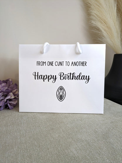 Luxury white rope birthday bag. With swearing in black writing.