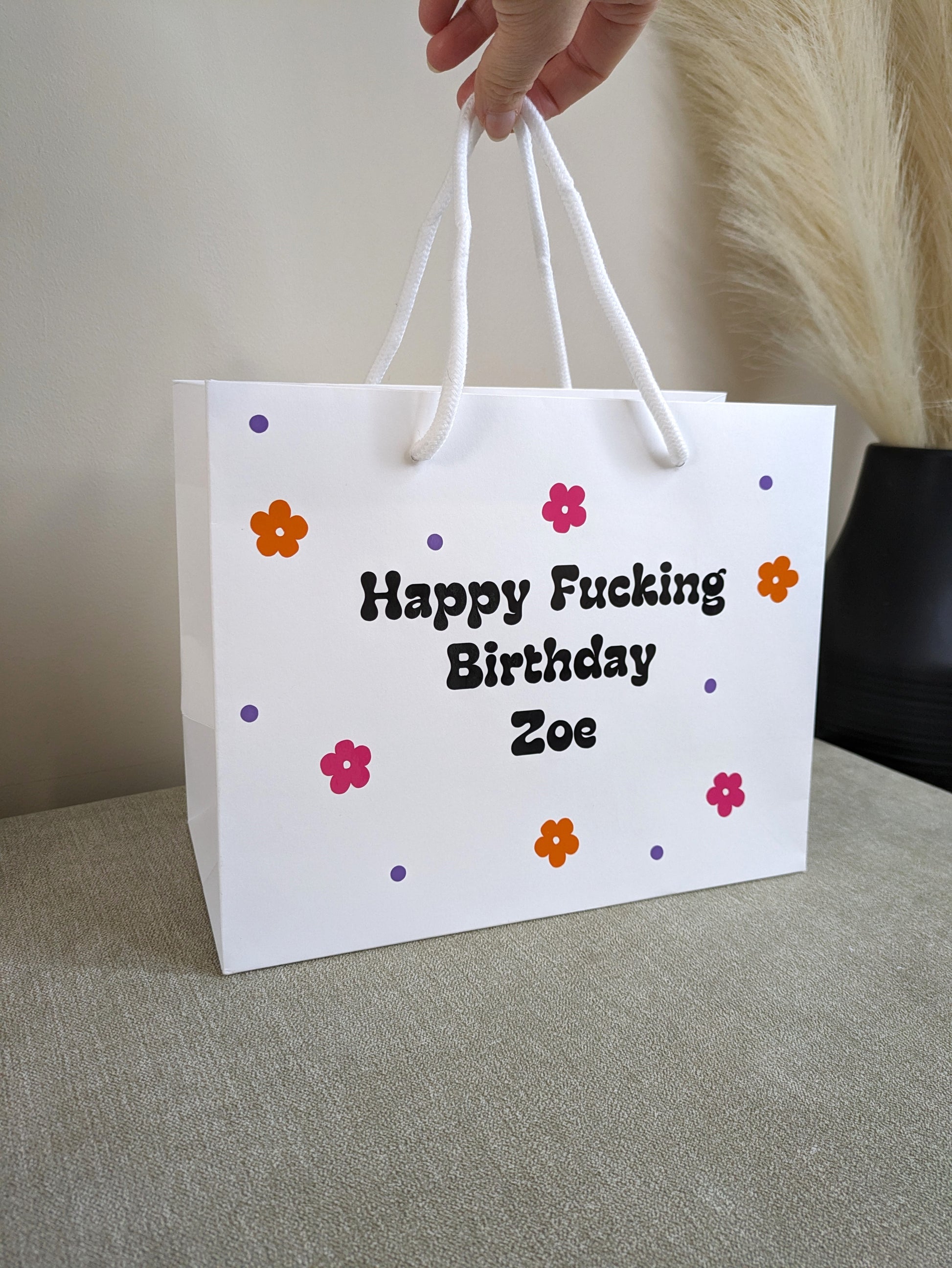 Bold swearing birthday wrap for her. 