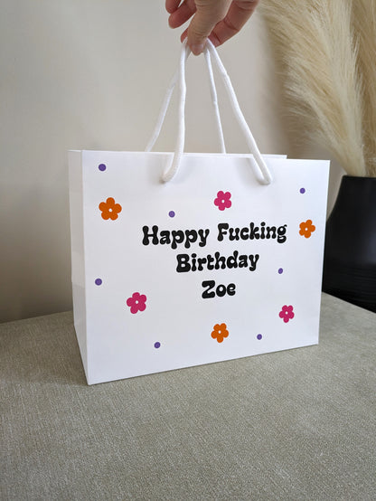 Bold swearing birthday wrap for her. 