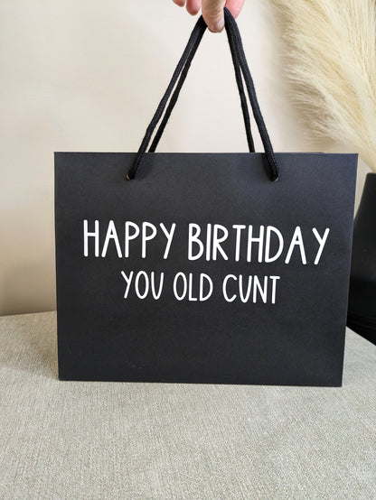 Black funny gift bag. Novelty design with black handles