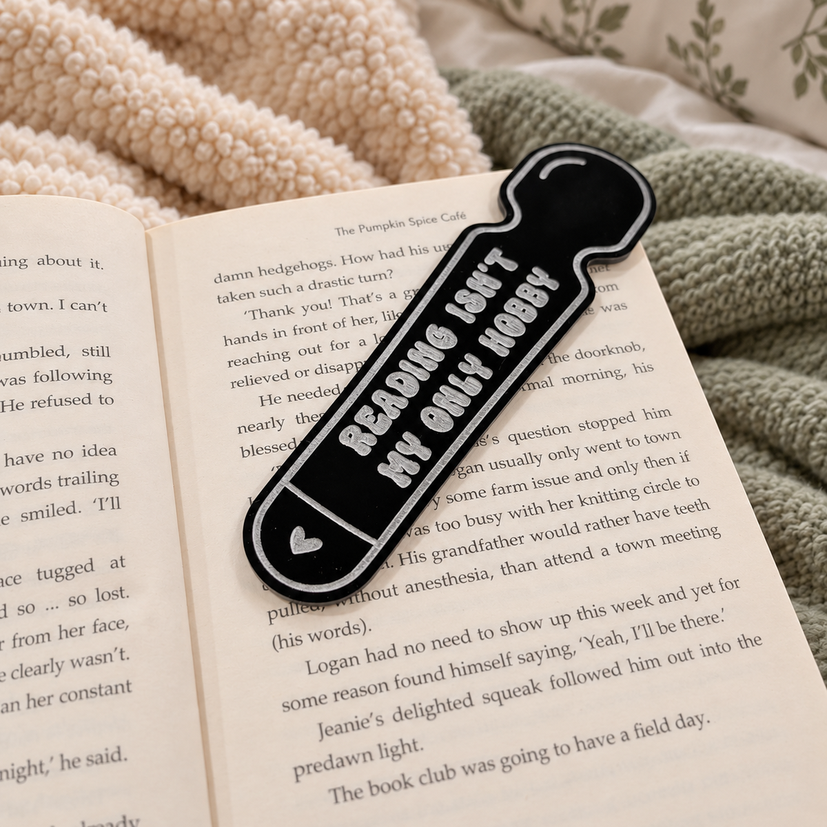 Wand vibrator bookmark that says reading isn't my only hobby