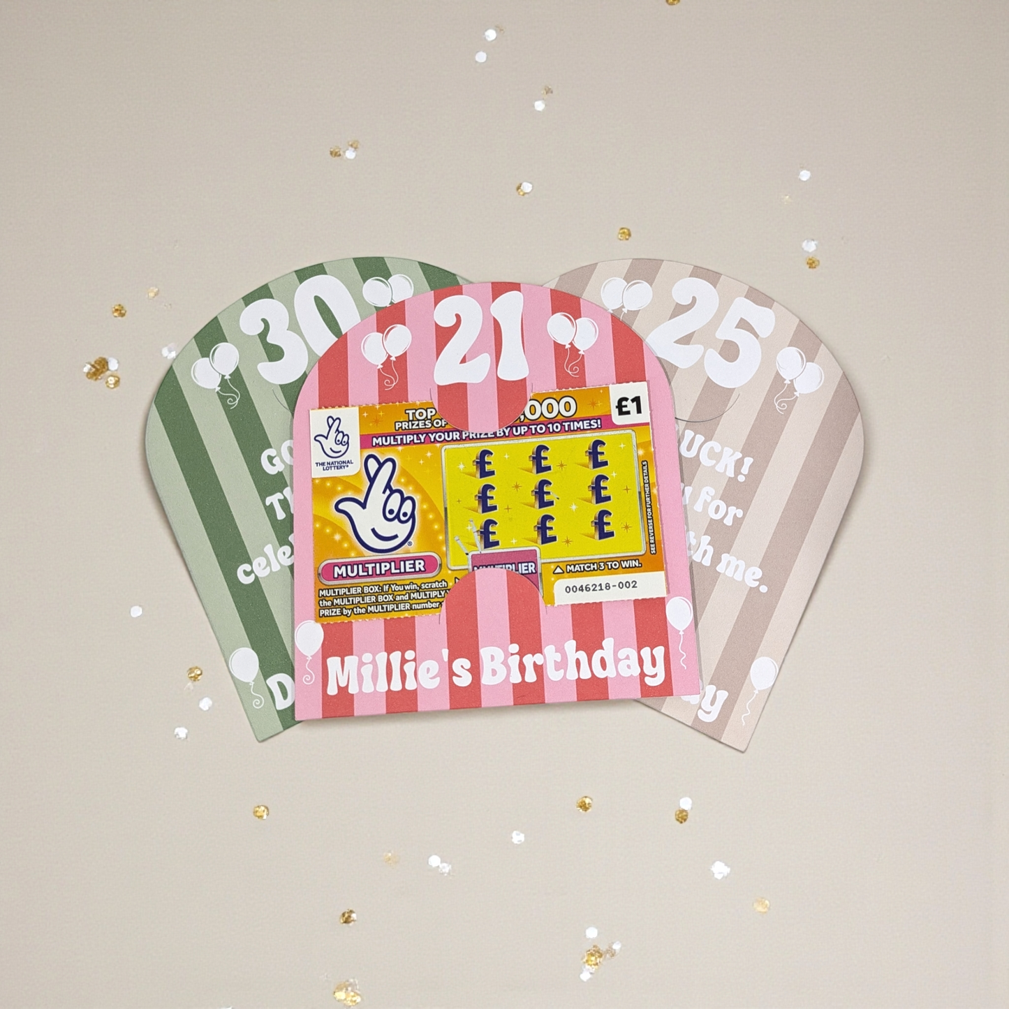 cheap party favours for adult on a cream table is confetti around the scratch card holders. 