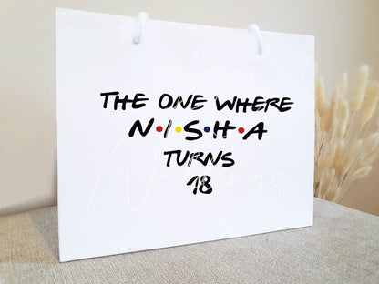 small white rop handle birthday gift bag. With the friends the one where and personlaised name. 