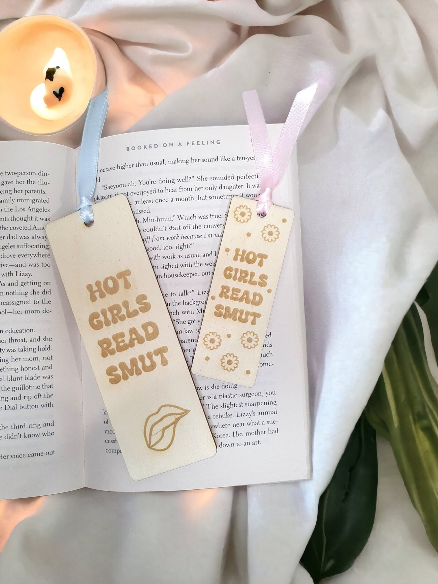 Smut bookmarks. Small bookmark has a cute daisy design and the large has a women lip bite. 