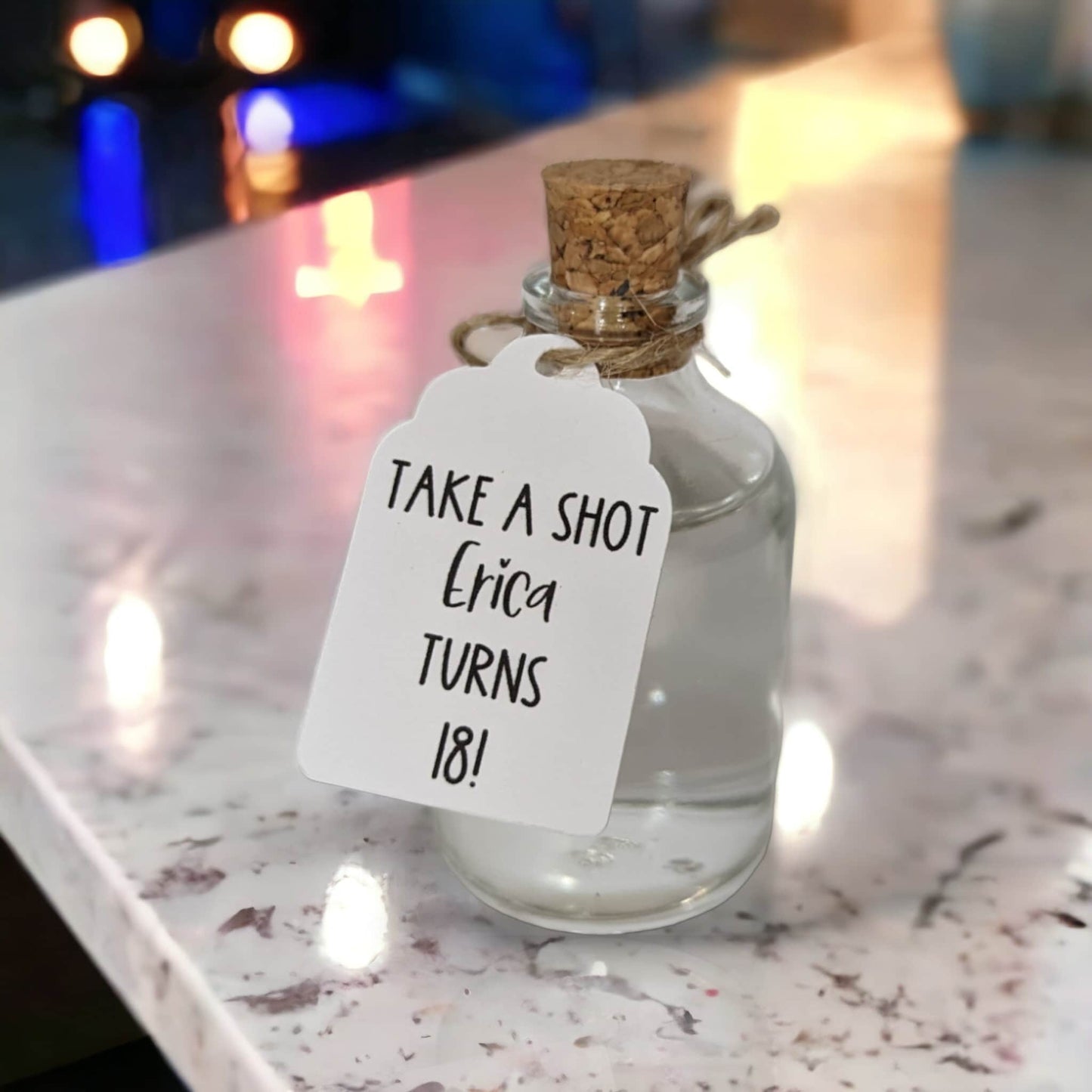 cork bottle with take a shot tag