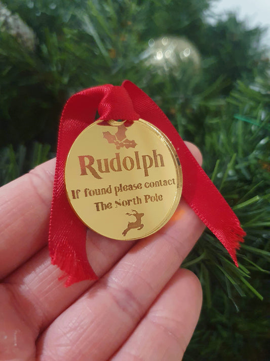 beautiful shinny gold ID tag for santas reindeer. Missing tag can be placed in the grass outside for young children to find after rudolph has flown over the house.