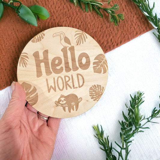 Beautiful maple wood with the words ' Hello World ' engraved in to the plaque. Designed for new born baby photo shoot. Jungle Themed